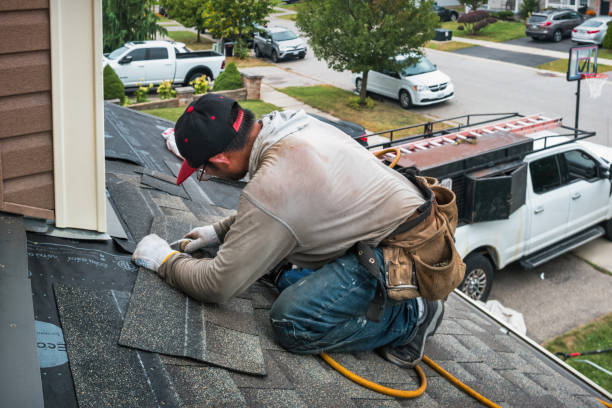 Professional Roof Leak Repair technician working in Hufsmith, TX